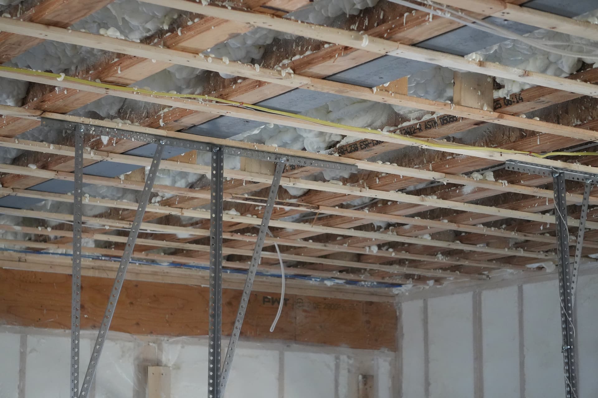 Ceiling framing and furring strips ready for blueboard installation