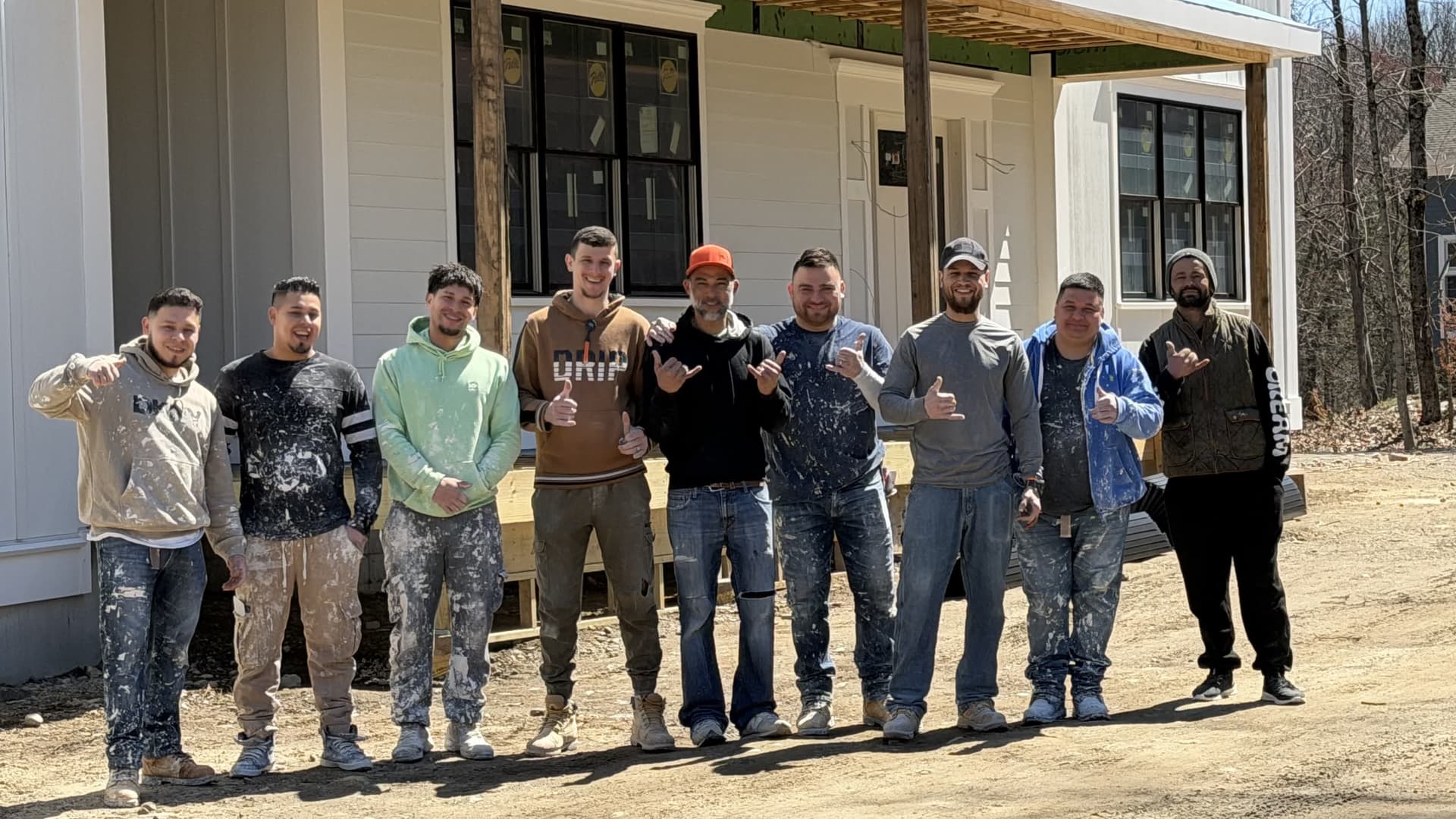 Full Emanuel Blueboard crew outside completed new build — MetroWest MA