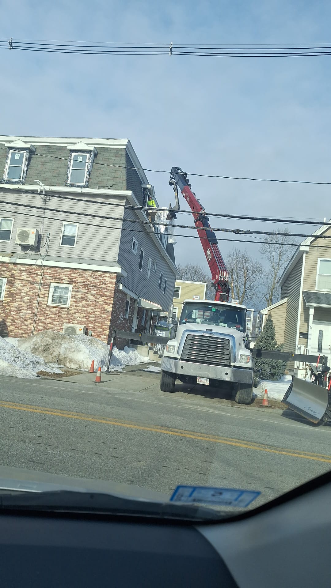 Large scale commercial blueboard job site with crane delivery